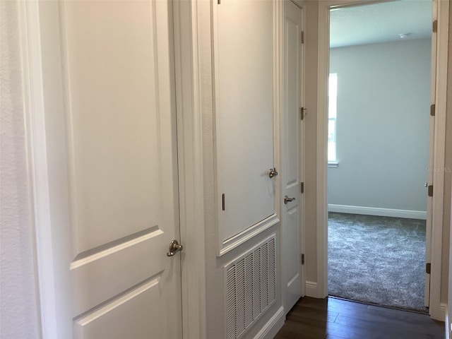 10540 SW 49th Avenue Rd, Ocala, FL 34476 - hall featuring dark wood-style floors and baseboards