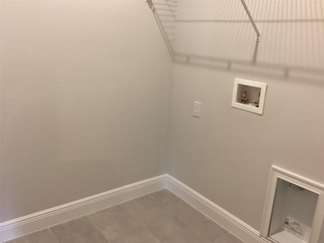 10540 SW 49th Avenue Rd, Ocala, FL 34476 - laundry area with baseboards and hookup for a washing machine