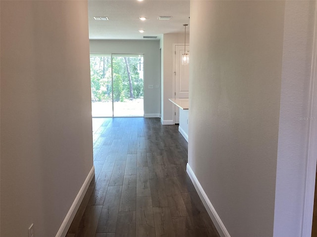 10540 SW 49th Avenue Rd, Ocala, FL 34476 - hallway featuring dark wood finished floors, baseboards, and recessed lighting