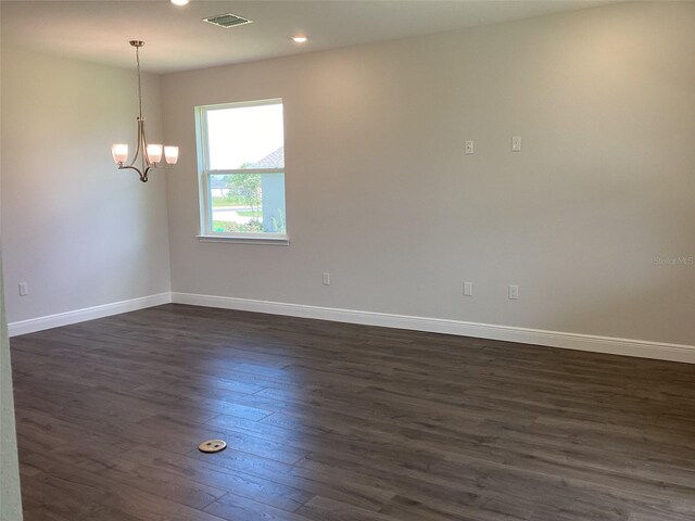 10540 SW 49th Avenue Rd, Ocala, FL 34476 - spare room with dark wood-type flooring, a chandelier, baseboards, and recessed lighting