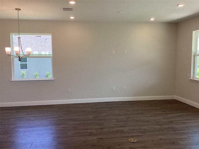 10540 SW 49th Avenue Rd, Ocala, FL 34476 - empty room featuring dark wood-type flooring, a chandelier, recessed lighting, and baseboards