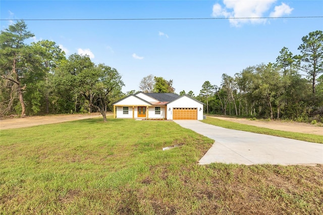 8200 SW 125th Court Rd, Dunnellon, FL 34432 - ranch-style house featuring concrete driveway, an attached garage, and a front lawn