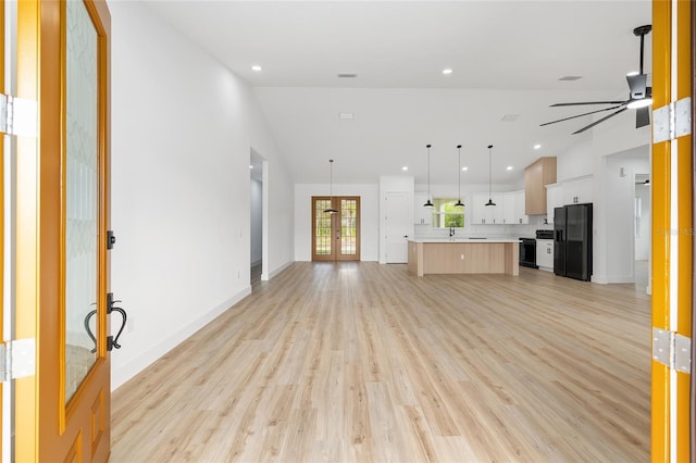 8200 SW 125th Court Rd, Dunnellon, FL 34432 - unfurnished living room featuring french doors, ceiling fan, light wood-style flooring, recessed lighting, and baseboards