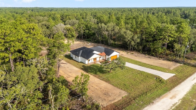 8200 SW 125th Court Rd, Dunnellon, FL 34432 - aerial view of property and surrounding area featuring a forest