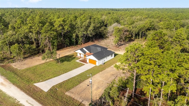 8200 SW 125th Court Rd, Dunnellon, FL 34432 - view from above of property with a heavily wooded area