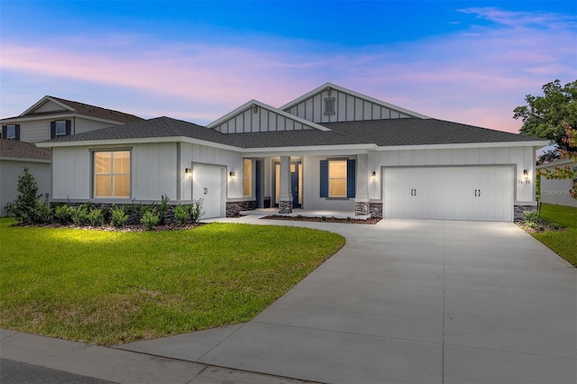 7638 SW 60th St, Ocala, FL 34474 - view of front of property with board and batten siding, a garage, a lawn, concrete driveway, and stone siding