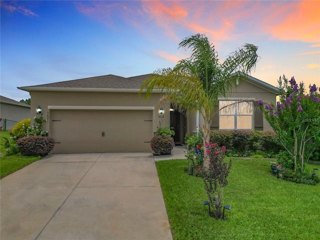 9237 SW 60th Terrace Rd, Ocala, FL 34476 - view of front of house featuring concrete driveway, a garage, a front lawn, and stucco siding
