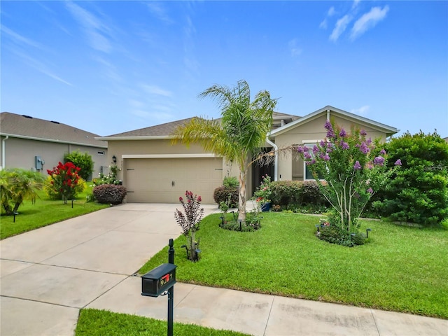 9237 SW 60th Terrace Rd, Ocala, FL 34476 - ranch-style house with an attached garage, stucco siding, driveway, and a front lawn