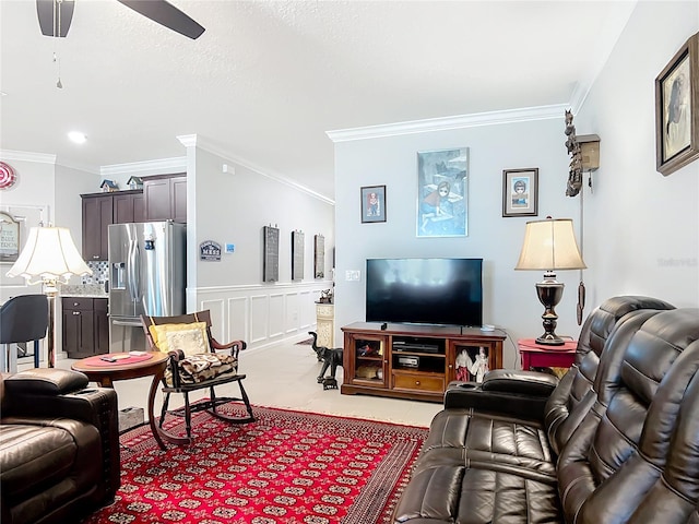 9237 SW 60th Terrace Rd, Ocala, FL 34476 - living area with crown molding, a ceiling fan, wainscoting, and a decorative wall