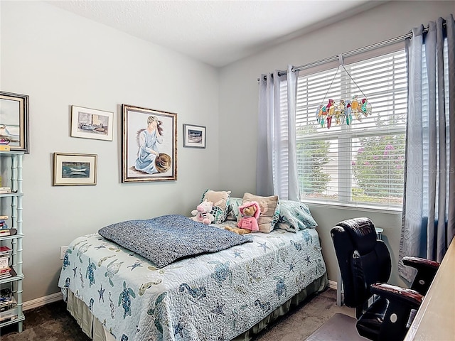 9237 SW 60th Terrace Rd, Ocala, FL 34476 - bedroom with carpet floors, baseboards, and an office area