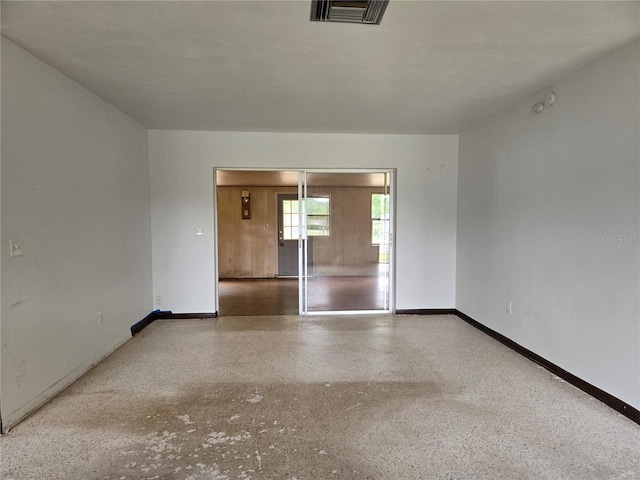9330 N Citrus Springs Blvd, Citrus Springs, FL 34434 - empty room with baseboards and speckled floor