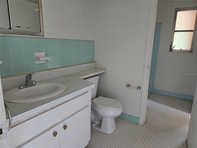 9330 N Citrus Springs Blvd, Citrus Springs, FL 34434 - bathroom featuring vanity, toilet, and tile patterned floors