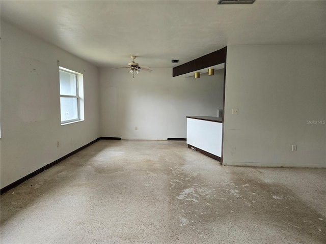 9330 N Citrus Springs Blvd, Citrus Springs, FL 34434 - empty room featuring ceiling fan and baseboards