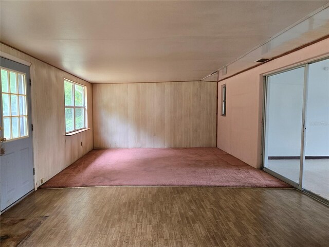 9330 N Citrus Springs Blvd, Citrus Springs, FL 34434 - carpeted spare room with wood finished floors and wood walls
