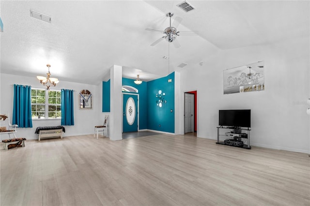 2698 SW 186th Ct, Dunnellon, FL 34432 - unfurnished living room with a chandelier, wood finished floors, a ceiling fan, and high vaulted ceiling