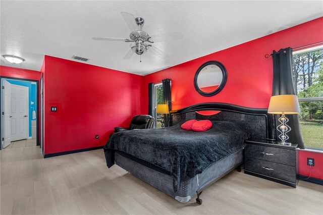 2698 SW 186th Ct, Dunnellon, FL 34432 - bedroom featuring wood finished floors and ceiling fan