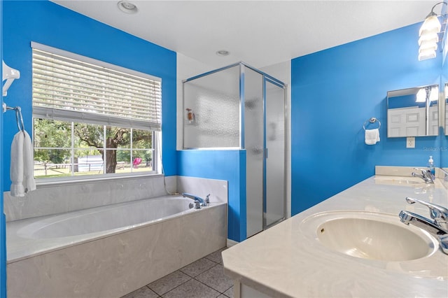 2698 SW 186th Ct, Dunnellon, FL 34432 - bathroom with tile patterned floors, a bath, a shower stall, and double vanity