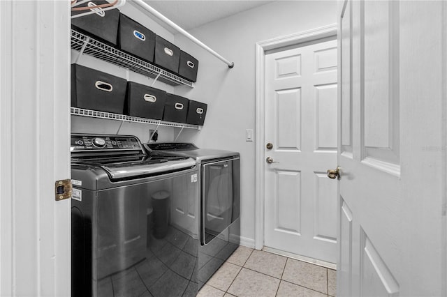 2698 SW 186th Ct, Dunnellon, FL 34432 - laundry area featuring washer and dryer and light tile patterned floors