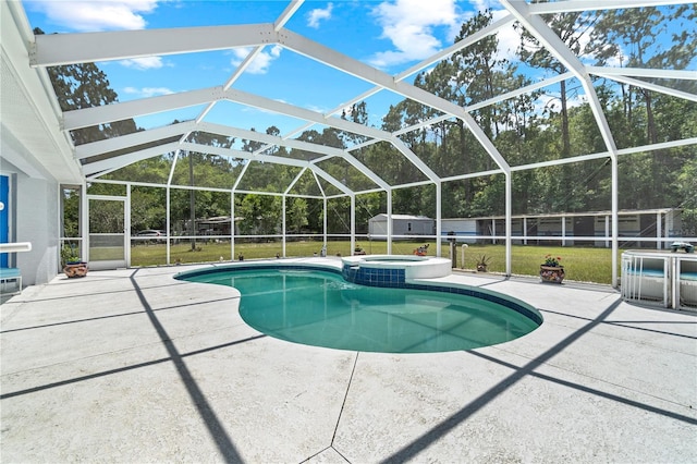 2698 SW 186th Ct, Dunnellon, FL 34432 - view of pool with a patio area, a lawn, a storage unit, a pool with connected hot tub, and glass enclosure