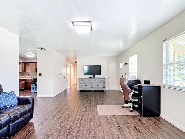 1520 NE 17th Ave, Ocala, FL 34470 - home office with dark wood finished floors and baseboards