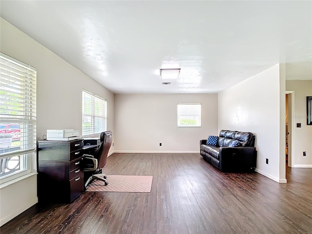 1520 NE 17th Ave, Ocala, FL 34470 - office featuring dark wood finished floors, healthy amount of natural light, and baseboards