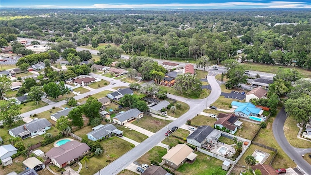 1520 NE 17th Ave, Ocala, FL 34470 - aerial view of property and surrounding area featuring nearby suburban area and a forest
