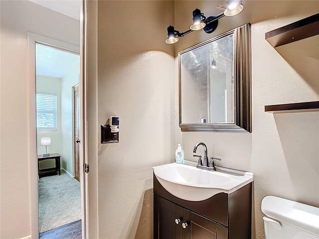 1520 NE 17th Ave, Ocala, FL 34470 - half bathroom with vanity and toilet