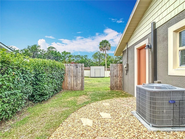 1520 NE 17th Ave, Ocala, FL 34470 - view of yard with cooling unit and a storage unit