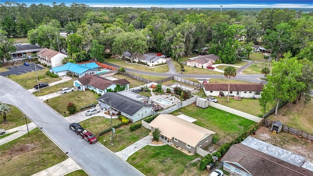 1520 NE 17th Ave, Ocala, FL 34470 - aerial perspective of suburban area with a heavily wooded area