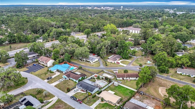 1520 NE 17th Ave, Ocala, FL 34470 - view of property location featuring a heavily wooded area and nearby suburban area