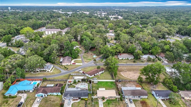 1520 NE 17th Ave, Ocala, FL 34470 - aerial overview of property's location with a forest and nearby suburban area
