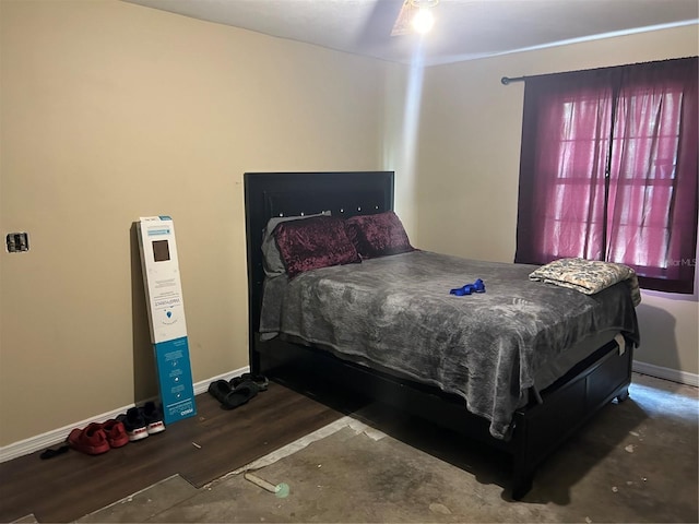 3885 NE 28th Ter, Ocala, FL 34479 - bedroom featuring baseboards and wood finished floors