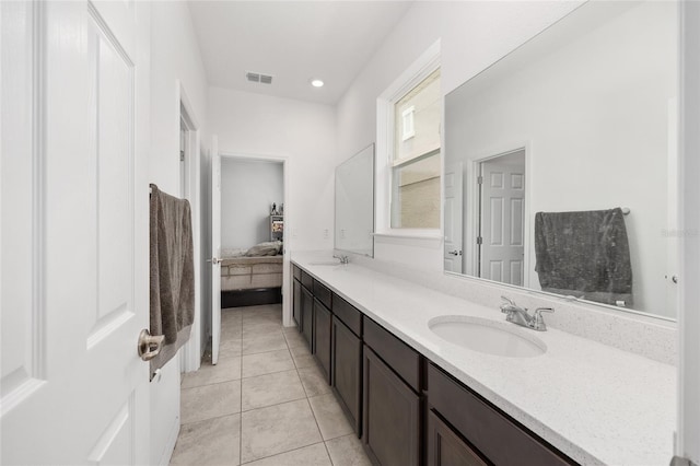 6486 SW 75th Avenue Rd, Ocala, FL 34474 - full bath featuring double vanity, tile patterned floors, ensuite bath, and recessed lighting