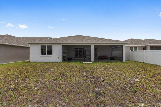 6486 SW 75th Avenue Rd, Ocala, FL 34474 - rear view of property with a sunroom and stucco siding