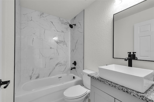 5709 NW 6th Pl, Ocala, FL 34482 - full bathroom with vanity, a textured wall, toilet, and bathing tub / shower combination