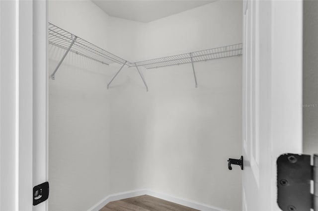5709 NW 6th Pl, Ocala, FL 34482 - spacious closet featuring wood finished floors