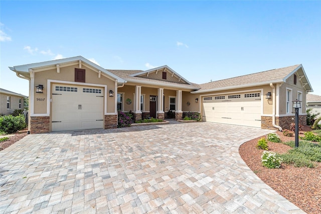 9607 SW 79th Lane Rd, Ocala, FL 34481 - craftsman inspired home with a garage, stucco siding, and stone siding