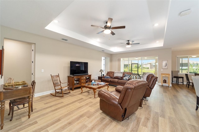 9607 SW 79th Lane Rd, Ocala, FL 34481 - living room with a raised ceiling, light wood finished floors, ceiling fan, baseboards, and recessed lighting