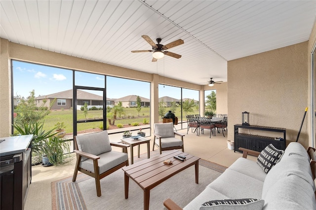 9607 SW 79th Lane Rd, Ocala, FL 34481 - sunroom featuring an outdoor hangout area, a ceiling fan, and outdoor dining area