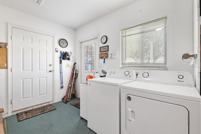17890 SE 96th Ct, Summerfield, FL 34491 - washroom featuring washing machine and clothes dryer, carpet, and a textured ceiling
