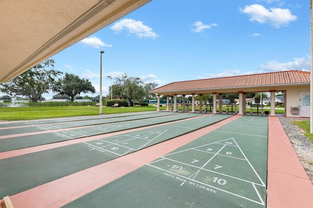 17890 SE 96th Ct, Summerfield, FL 34491 - view of home's community with a yard and shuffleboard