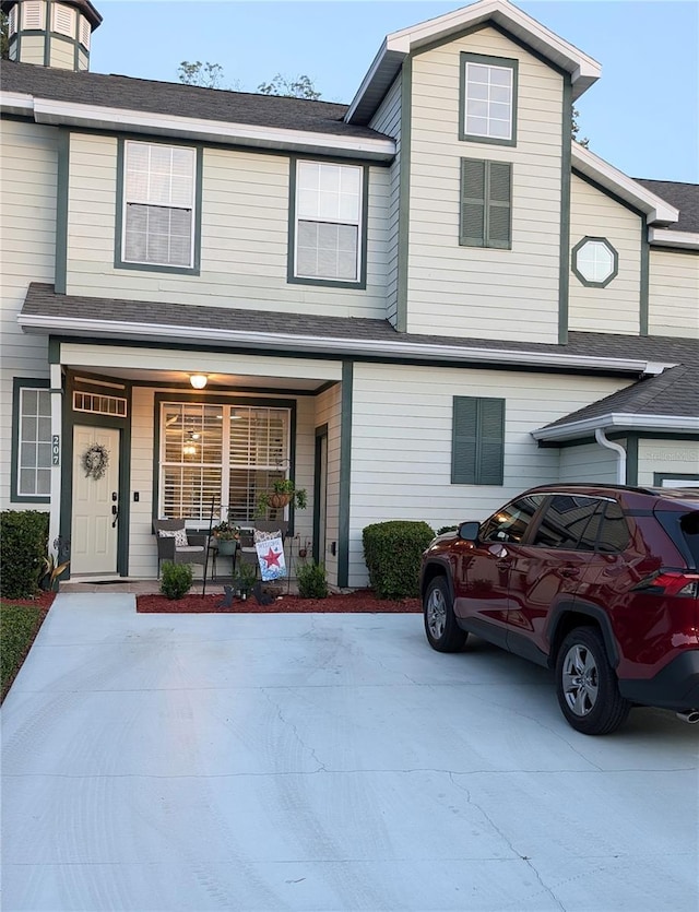 231 NE 28th Ave Unit 207, Ocala, FL 34470 - view of front of house featuring covered porch