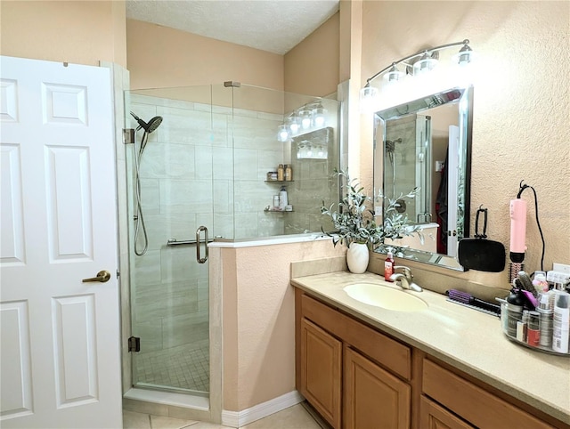 231 NE 28th Ave Unit 207, Ocala, FL 34470 - full bathroom featuring a shower stall, vanity, and tile patterned floors