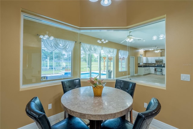 5815 NE 70th St, Silver Springs, FL 34488 - dining area featuring baseboards and ceiling fan