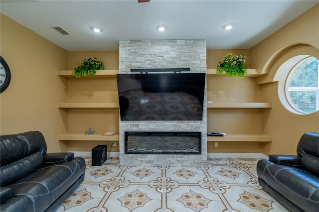 5815 NE 70th St, Silver Springs, FL 34488 - living area with a stone fireplace and built in shelves