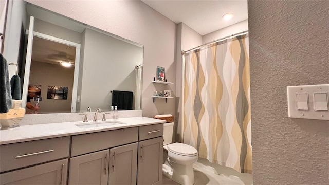 10287 SW 96th Ln, Ocala, FL 34481 - bathroom with a textured wall, vanity, toilet, and a shower with shower curtain