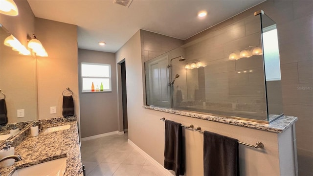 10287 SW 96th Ln, Ocala, FL 34481 - full bath with double vanity, walk in shower, tile patterned floors, and baseboards