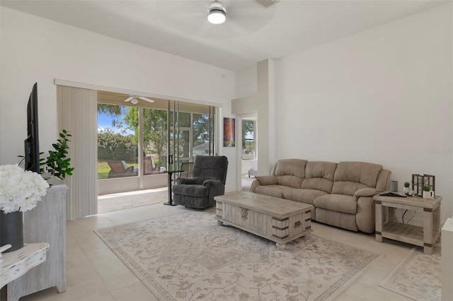 4731 N Crestline Dr, Beverly Hills, FL 34465 - living area with a ceiling fan, light tile patterned flooring, and a high ceiling