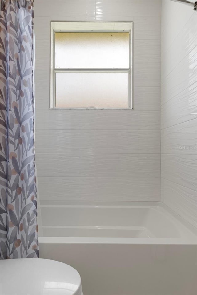 4731 N Crestline Dr, Beverly Hills, FL 34465 - full bathroom with plenty of natural light and shower / bathtub combination with curtain