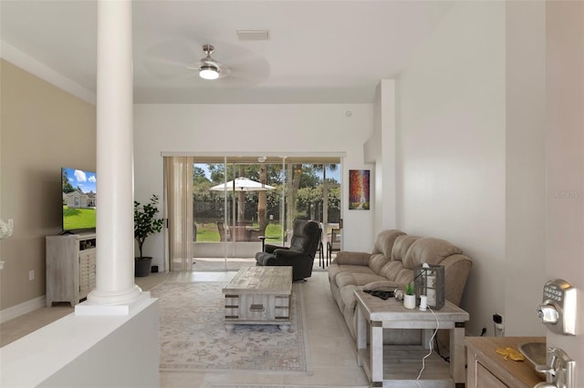 4731 N Crestline Dr, Beverly Hills, FL 34465 - living room with decorative columns, a ceiling fan, and light tile patterned floors
